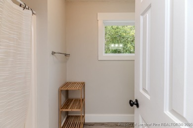Seller has outgrown this beautifully updated 2-bedroom on Carolina Trace Country Club in North Carolina - for sale on GolfHomes.com, golf home, golf lot