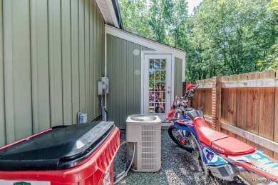 Seller has outgrown this beautifully updated 2-bedroom on Carolina Trace Country Club in North Carolina - for sale on GolfHomes.com, golf home, golf lot