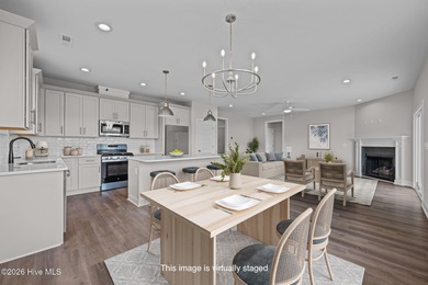 The Coventry welcomes you home. This newly-constructed 3-bedroom on Carolina Colours Golf Club in North Carolina - for sale on GolfHomes.com, golf home, golf lot