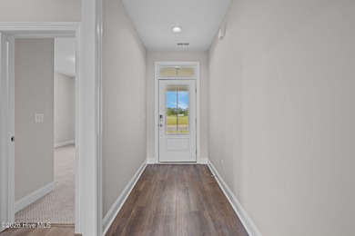 The Coventry welcomes you home. This newly-constructed 3-bedroom on Carolina Colours Golf Club in North Carolina - for sale on GolfHomes.com, golf home, golf lot