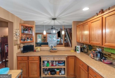 Welcome to your dream home-a true Southern Charmer rare high on Eagles Landing Country Club in Georgia - for sale on GolfHomes.com, golf home, golf lot