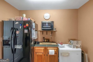 Welcome to your dream home-a true Southern Charmer rare high on Eagles Landing Country Club in Georgia - for sale on GolfHomes.com, golf home, golf lot