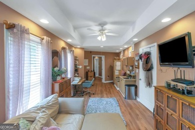 Welcome to your dream home-a true Southern Charmer rare high on Eagles Landing Country Club in Georgia - for sale on GolfHomes.com, golf home, golf lot