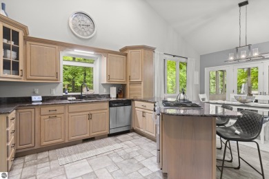 Custom-built home featuring a new roof, skylights, AC, and on  in Michigan - for sale on GolfHomes.com, golf home, golf lot