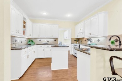 Welcome to this Traditional Red Brick home located on a highly on Hide-A-Way Lake Golf Course in Texas - for sale on GolfHomes.com, golf home, golf lot