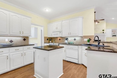 Welcome to this Traditional Red Brick home located on a highly on Hide-A-Way Lake Golf Course in Texas - for sale on GolfHomes.com, golf home, golf lot