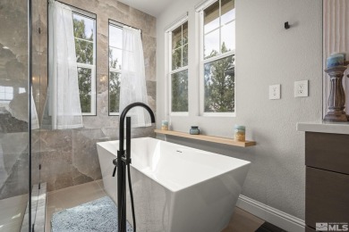 Nestled in a gated Somersett community, this charming home on Somersett Country Club in Nevada - for sale on GolfHomes.com, golf home, golf lot
