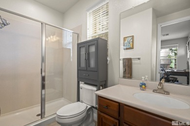 Nestled in a gated Somersett community, this charming home on Somersett Country Club in Nevada - for sale on GolfHomes.com, golf home, golf lot