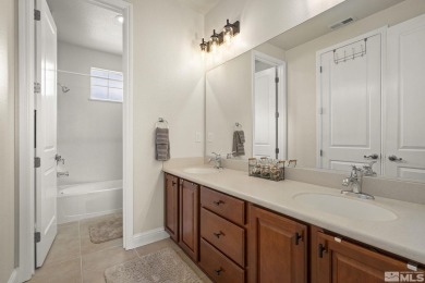 Nestled in a gated Somersett community, this charming home on Somersett Country Club in Nevada - for sale on GolfHomes.com, golf home, golf lot