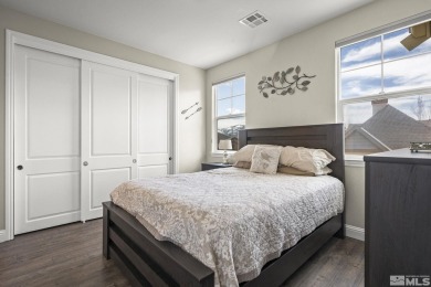 Nestled in a gated Somersett community, this charming home on Somersett Country Club in Nevada - for sale on GolfHomes.com, golf home, golf lot