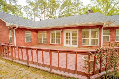 Welcome to this Traditional Red Brick home located on a highly on Hide-A-Way Lake Golf Course in Texas - for sale on GolfHomes.com, golf home, golf lot