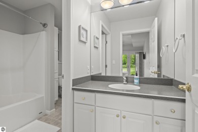 Custom-built home featuring a new roof, skylights, AC, and on  in Michigan - for sale on GolfHomes.com, golf home, golf lot