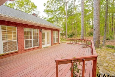 Welcome to this Traditional Red Brick home located on a highly on Hide-A-Way Lake Golf Course in Texas - for sale on GolfHomes.com, golf home, golf lot