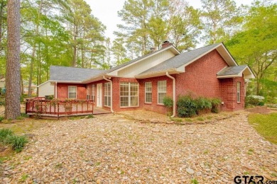 Welcome to this Traditional Red Brick home located on a highly on Hide-A-Way Lake Golf Course in Texas - for sale on GolfHomes.com, golf home, golf lot