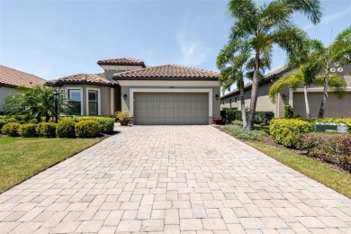 Live the resort lifestyle in this beautifully enhanced Piceno on Esplanade Golf and Country at Lakewood Ranch in Florida - for sale on GolfHomes.com, golf home, golf lot