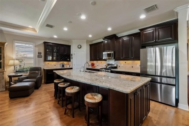 Live the resort lifestyle in this beautifully enhanced Piceno on Esplanade Golf and Country at Lakewood Ranch in Florida - for sale on GolfHomes.com, golf home, golf lot