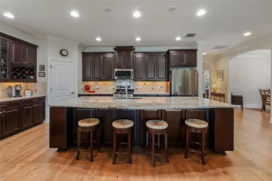Live the resort lifestyle in this beautifully enhanced Piceno on Esplanade Golf and Country at Lakewood Ranch in Florida - for sale on GolfHomes.com, golf home, golf lot