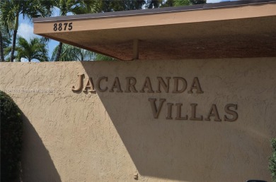 Experience serenity in this stunning 1-bedroom, 1-bathroom on Jacaranda Golf Club in Florida - for sale on GolfHomes.com, golf home, golf lot