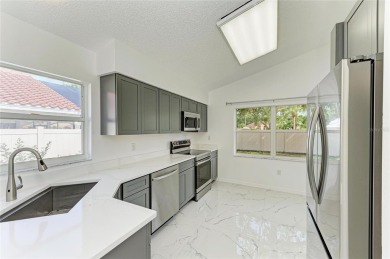 Discover the perfect blend of comfort, style, and convenience in on Palm Aire Country Club of Sarasota in Florida - for sale on GolfHomes.com, golf home, golf lot