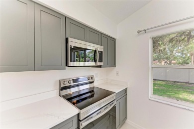 Discover the perfect blend of comfort, style, and convenience in on Palm Aire Country Club of Sarasota in Florida - for sale on GolfHomes.com, golf home, golf lot