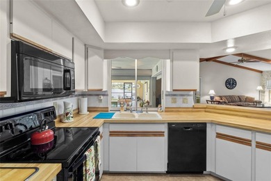 Welcome to this beautifully maintained waterfront home located on Jacaranda West Country Club in Florida - for sale on GolfHomes.com, golf home, golf lot