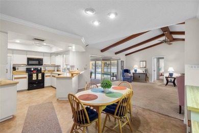 Welcome to this beautifully maintained waterfront home located on Jacaranda West Country Club in Florida - for sale on GolfHomes.com, golf home, golf lot