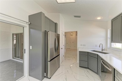 Discover the perfect blend of comfort, style, and convenience in on Palm Aire Country Club of Sarasota in Florida - for sale on GolfHomes.com, golf home, golf lot