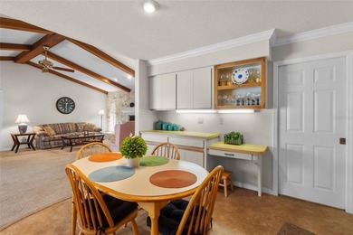 Welcome to this beautifully maintained waterfront home located on Jacaranda West Country Club in Florida - for sale on GolfHomes.com, golf home, golf lot