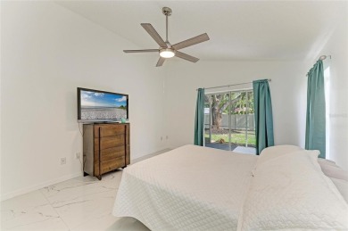 Discover the perfect blend of comfort, style, and convenience in on Palm Aire Country Club of Sarasota in Florida - for sale on GolfHomes.com, golf home, golf lot