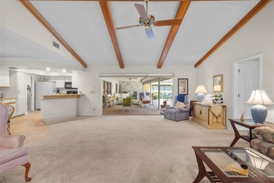 Welcome to this beautifully maintained waterfront home located on Jacaranda West Country Club in Florida - for sale on GolfHomes.com, golf home, golf lot