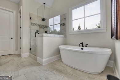 Timeless elegance meets resort-style living in this exquisite on Manor Golf and Country Club in Georgia - for sale on GolfHomes.com, golf home, golf lot