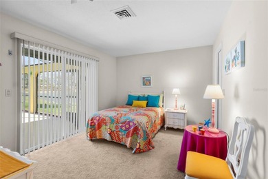 Welcome to this beautifully maintained waterfront home located on Jacaranda West Country Club in Florida - for sale on GolfHomes.com, golf home, golf lot