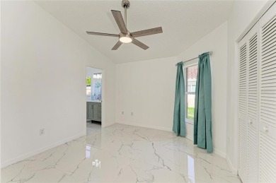 Discover the perfect blend of comfort, style, and convenience in on Palm Aire Country Club of Sarasota in Florida - for sale on GolfHomes.com, golf home, golf lot