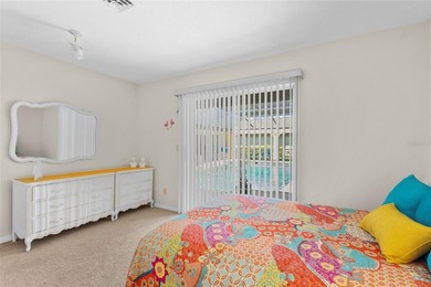 Welcome to this beautifully maintained waterfront home located on Jacaranda West Country Club in Florida - for sale on GolfHomes.com, golf home, golf lot