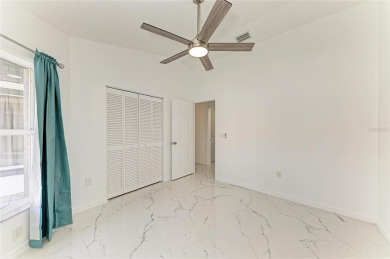 Discover the perfect blend of comfort, style, and convenience in on Palm Aire Country Club of Sarasota in Florida - for sale on GolfHomes.com, golf home, golf lot