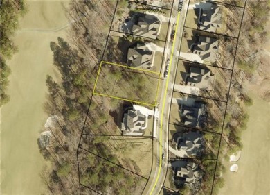 This beautiful wooded lot is located on the golf course in the on The Governors Towne Club in Georgia - for sale on GolfHomes.com, golf home, golf lot