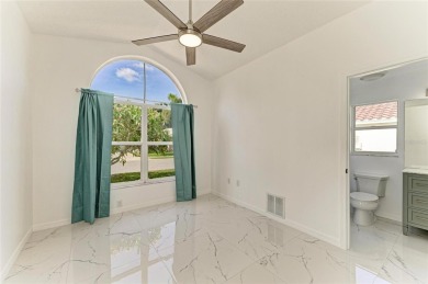 Discover the perfect blend of comfort, style, and convenience in on Palm Aire Country Club of Sarasota in Florida - for sale on GolfHomes.com, golf home, golf lot