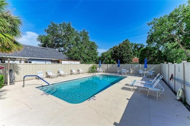 Discover the perfect blend of comfort, style, and convenience in on Palm Aire Country Club of Sarasota in Florida - for sale on GolfHomes.com, golf home, golf lot