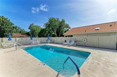 Discover the perfect blend of comfort, style, and convenience in on Palm Aire Country Club of Sarasota in Florida - for sale on GolfHomes.com, golf home, golf lot