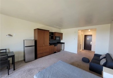 RESORT LIVING STYLE. Gorgeous lake, mountains, and golf course on Reflection Bay Golf Club in Nevada - for sale on GolfHomes.com, golf home, golf lot