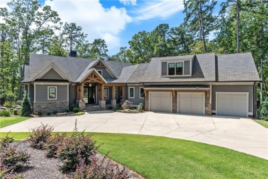 Indulge in the epitome of lakeside luxury with this exquisite on Reynolds Lake Oconee - The Oconee in Georgia - for sale on GolfHomes.com, golf home, golf lot