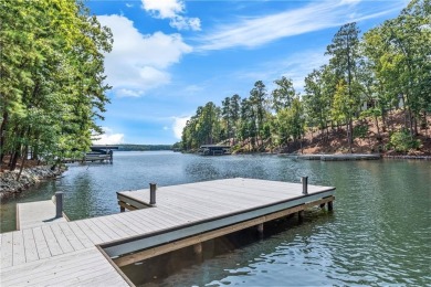 Indulge in the epitome of lakeside luxury with this exquisite on Reynolds Lake Oconee - The Oconee in Georgia - for sale on GolfHomes.com, golf home, golf lot