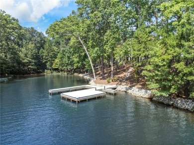 Indulge in the epitome of lakeside luxury with this exquisite on Reynolds Lake Oconee - The Oconee in Georgia - for sale on GolfHomes.com, golf home, golf lot