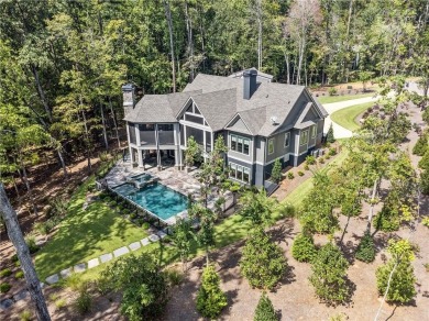 Indulge in the epitome of lakeside luxury with this exquisite on Reynolds Lake Oconee - The Oconee in Georgia - for sale on GolfHomes.com, golf home, golf lot