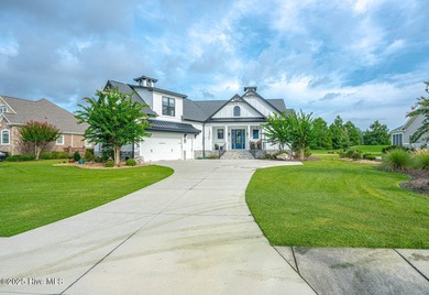 INCREDIBLE CURB APPEAL and stunning green-to-tee views of the #1 on Crow Creek Golf Club in North Carolina - for sale on GolfHomes.com, golf home, golf lot