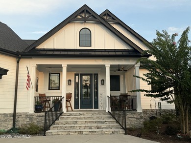 INCREDIBLE CURB APPEAL and stunning green-to-tee views of the #1 on Crow Creek Golf Club in North Carolina - for sale on GolfHomes.com, golf home, golf lot