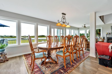 This lovely 3 bedroom 3 bathroom waterfront home was built in on Brick Landing Plantation Yacht and Golf Club in North Carolina - for sale on GolfHomes.com, golf home, golf lot