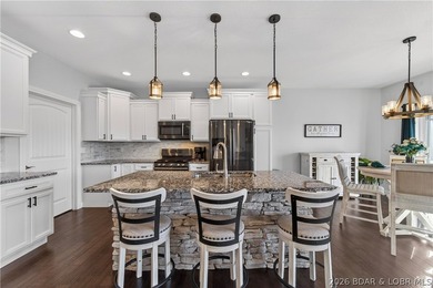 Set along the gorgeous shoreline of Lake of the Ozarks, this on Bayview Golf Course in Missouri - for sale on GolfHomes.com, golf home, golf lot