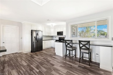 Located in San Carlos Park with NO HOA fees, this versatile on Estero Country Club in Florida - for sale on GolfHomes.com, golf home, golf lot