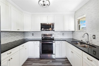 Located in San Carlos Park with NO HOA fees, this versatile on Estero Country Club in Florida - for sale on GolfHomes.com, golf home, golf lot